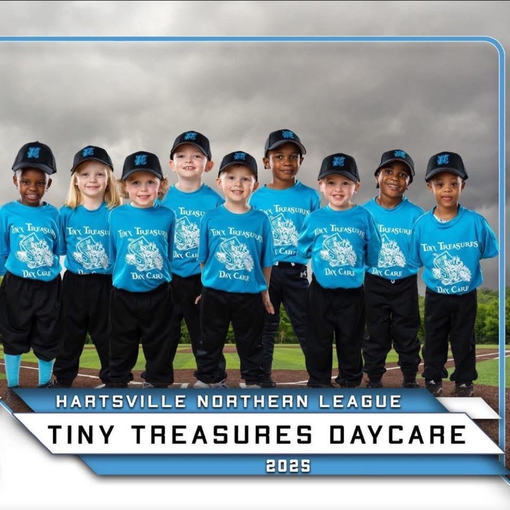 A youth tee-ball team wearing Tiny Treasures Daycare jerseys, Hartsville Northern League 2025